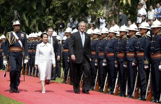 President George W. Bush and Philippine president Gloria Arroyo review troops during a welcoming ceremony at Malacanang Palace in Manila, Philippines, Saturday, Oct. 18, 2003. White House photo by Paul Morse.