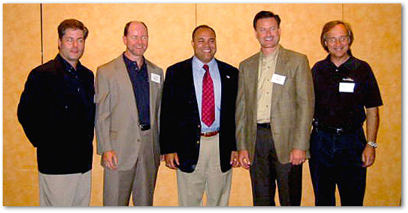 Photo of Chairman Powell with NextWeb, Inc. employees. Stefan Weyrauch; Graham Barnes, CEO, NextWeb Inc.; Chairman Powell; David Williams; and Donald Arndt.