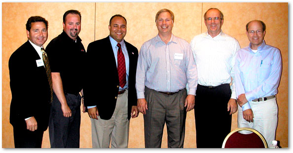 Photo of Chairman Powell with Gatespeed Broadband employees. Dan Arra, President and CEO; Matt Jennings; Chairman Powell; Bob Arasmith; Lance Ginner; Ralph Silveira.