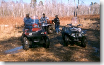 photo of people using off road vehicles