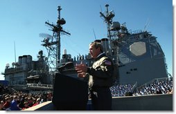  President George W. Bush speaks to sailors in front of the USS Philippine Sea at Naval Station Mayport in Mayport, Fla., Thursday, Feb. 13, 2003. White House photo by Eric Draper.