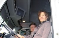 EPA Regional Administrator Jane M. Kenny and a trucker in his cab at the Truck Stop Electrification event in Paulsboro, NJ.