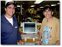 Robert Feldman (left), of Amersham Biosciences, and Craig Cary, University of Delaware; caption is below