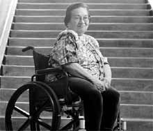 Photo: An older woman in a wheelchair.