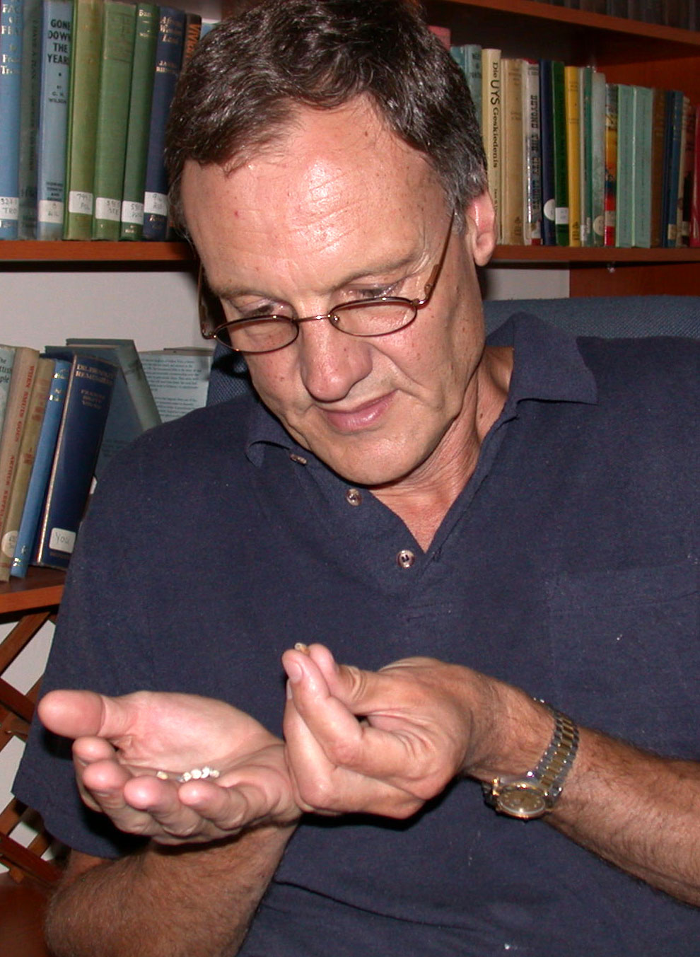 Chris Henshilwood examines tiny shell beads
