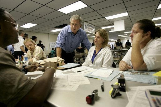 President George W. Bush visits with hurricane relief workers at Martin County Red Cross Headquarters in Stuart, Fla., Thursday, Sept. 30, 2004. "See, these volunteers show the true heart of America, because we're a compassionate people, we care when a neighbor hurts, we long to help somebody when help is needed," said the President. "They have the gratitude of all they've served, and they have the admiration for our whole country." White House photo by Eric Draper.
