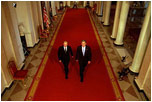 President George W. Bush and Russian President Vladimir Putin walk out to address the media at the White House on Nov. 13, 2001. "This is a new day in the long history of Russian-American relations, a day of progress and a day of hope," said President Bush in his remarks.