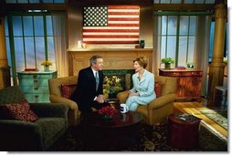 Laura Bush speaks with Charlie Gibson during a Good Morning America live interview at the ABC Studios in New York City, Monday, May 10, 2004. White House photo by Tina Hager.