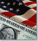 Detail of American flag and dollar bill.