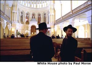 Leaders of the Jewish Community in St. Petersburg, Russia, stand inside the Grand Choral Synagogue while President Bush and Laura Bush tour restoration of the synagogue, the only Jewish house of worship in a city of 4.5 million people.  White House photo by Paul Morse