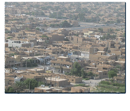 Over 5 million Iraqis live in homes like these in greater Baghdad, as seen from a helicopter transporting the Congressional delegation.