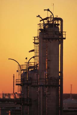 picture of industry with a sundown background