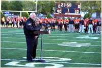Standing in the stadium where he once played football, Vice President Dick Cheney delivers remarks to a hometown crowd at the Cheney Alumni Field dedication ceremony in Casper, Wyo., Sept. 20, 2002. 