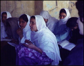 Afghan women reading and writing