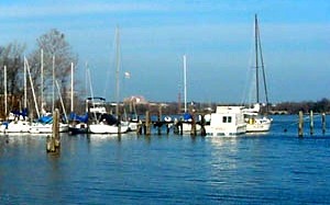 boats docked on lake shore